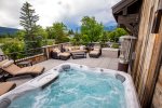 Enjoy the hot tub on the spacious roof top patio
